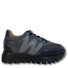 Gray sneaker with black sole on a white background