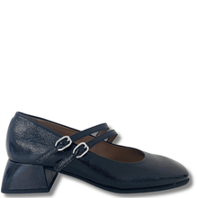 BLACK shoe with a strap on a white background
