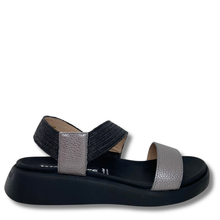 Black and silver sandal on a white background