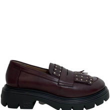 Brown leather loafer with chunky sole on a white background