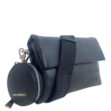 Black textured leather crossbody bag with a matching round coin pouch and a black shoulder strap, featuring the embossed 'wonders' logo.