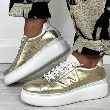 ladies gold metallic sneakers with white soles