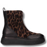 A single ankle boot with a brown and black leopard print side panel, black textured leather heel and toe, and a thick black platform sole, shown against a plain white background.