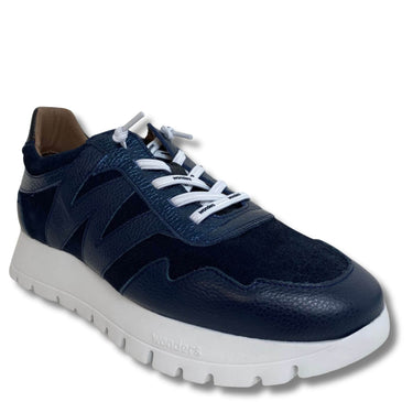 Navy blue sneaker with white laces on a white background