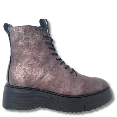 pewter leather boot with black sole on a white background