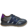 Gray sneaker with purple accents on a white background