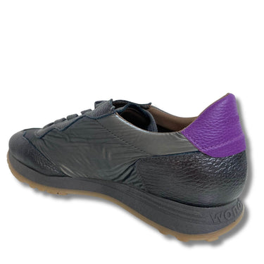 Gray shoe with purple heel on a white background