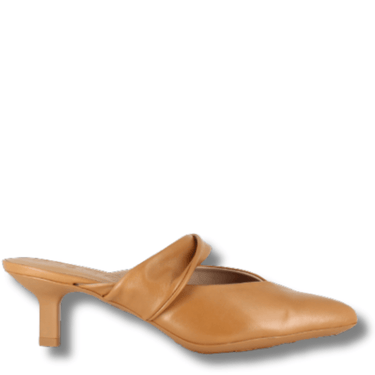 Tan leather slip-on shoe with a slight heel on a white background