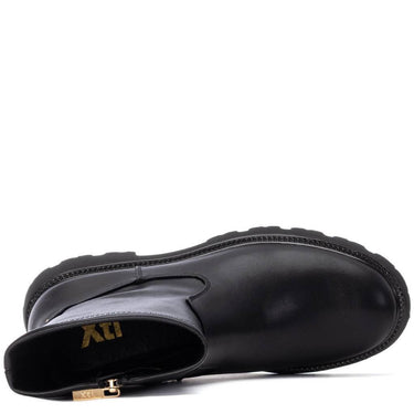 Black boot with gold zipper on a white background