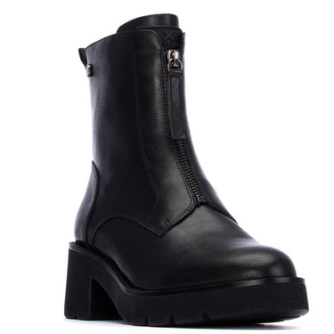Black leather boot with a platform sole on a white background