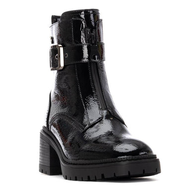 Black patent leather boot with buckle on a white background