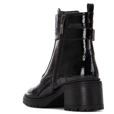 Black patent leather boot with a block heel on a white background