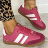 xti-fuchsia-pink-slim-line-gum-sole-sneakers.jpg