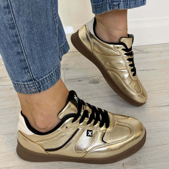 xti-gold-metallic-slim-line-gum-sole-sneakers.jpg