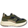 A low-top chunky sneaker in olive green, navy blue, and beige suede and mesh panels, featuring a thick textured off-white midsole and a pull tab on the heel, shown against a plain white background.