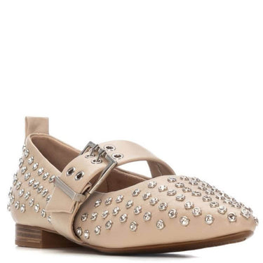 Beige flat shoe with rhinestone embellishments on a white background