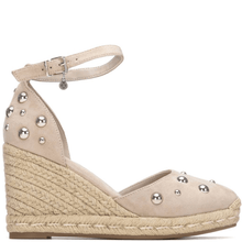 Beige wedge sandal with embellishments on a white background