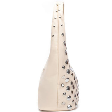 Beige handbag with decorative studs on a white background