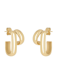 Gold hoop earrings on a white background