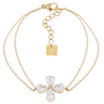 Gold bracelet with a clasp and a pendant featuring the brand 'ZAG' on a white background.