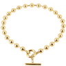 Gold beaded bracelet with a clasp on a white background