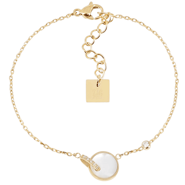 Gold bracelet with a white stone and clasp on a white background