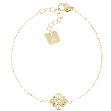 Gold bracelet with a clasp and tag on a white background