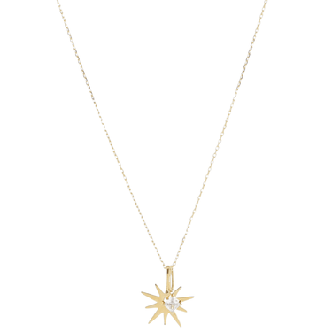Gold necklace with a star-shaped pendant on a white background