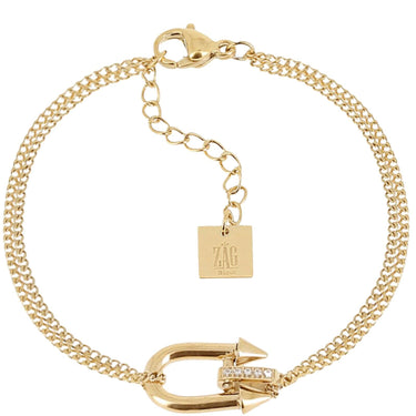 Gold bracelet with a clasp and 'ZAG' tag on a white background