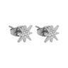 A pair of silver huggie hoop earrings paved with small clear stones, shown on a light gray background.