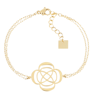 Gold bracelet with a intricate design on a white background