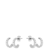 Silver hoop earrings with clear stones on a white background