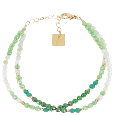 Two layered beaded bracelets with green and white beads on a gold chain, on a white background.
