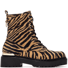 Zebra-patterned boot on a white background