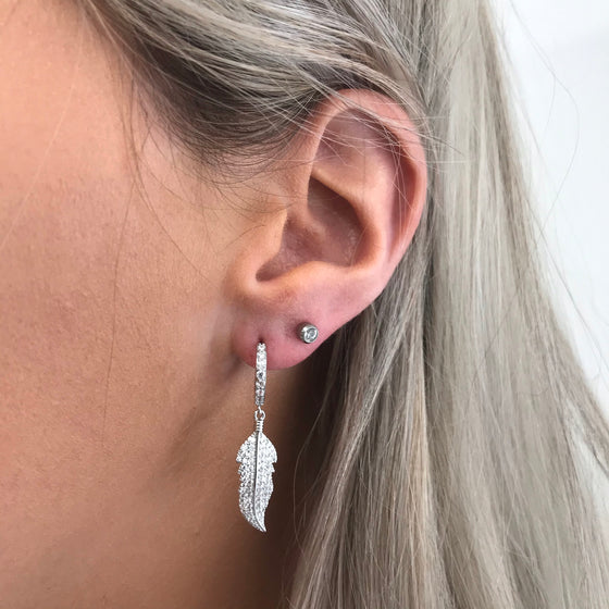 Feather Polished Huggie Hoop Earrings Crystal Cartilage Ear Piercing –  Impuria Ear Piercing Jewelry