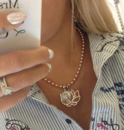 	Rebecca My World Hollywood Rose Gold Charm on a necklace