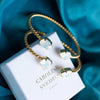 Caroline Svedbom Gold Mini Drop Twist Bangle - White Opal